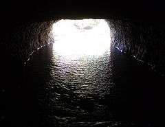 Montgomery Bell Tunnel opening, viewed from inside the tunnel during low water conditions