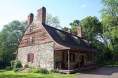 Photo of stone and wood house