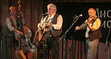 Photo of  Mucky Duck Bush Band at CD/Book Launch, Fairbrdge Festival, April 26 2014. L-R: John Perry, Don Blue, erik Kowarski