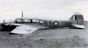 Twin-engined military monoplane lying on belly