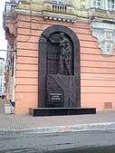 Soviet-style bas-relief of a ripped shirtless worker