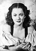 Black-and-white photo of Olivia de Havilland in 1936.