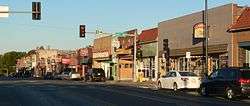 Several blocks of one- and two-story storefronts