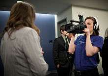 Planet Forward intern Sarah Snyder videos during the 2011 PBS special reception.