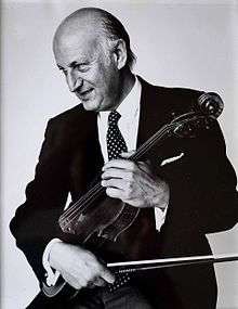 Peter Schidlof with the "MacDonald" Stradivarius of 1701.