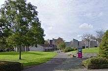 late 1960s new town terraced housing in Glenrothes complete with concrete urban sculpture and segregated public footpath using Radburn housing layout technique