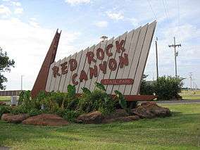 A photo of a sign for Red Rock Canyon State Park