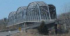 Steel bridge with three through truss spans