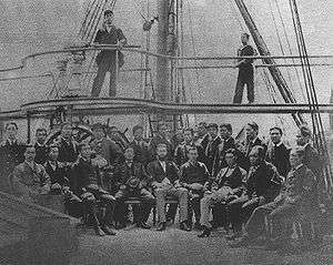 Group of men on the deck of a ship.