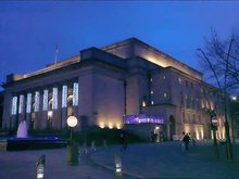 Sheffield City Hall, a Neo-classical design with a large portico and prominent pillars which were damaged when a bomb fell on the adjoining Barkers Pool during the Second World War. It is a grade II* listed building