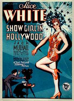 Movie poster featuring a large illustration of a young woman wearing a short orange-red dance outfit, high heels, and headdress. Her head is surrounded by shooting stars and sparkles. At her feet, much smaller-scaled, are two men—one is shouting through a megaphone, the other is operating a movie camera. The accompanying text is dominated by the name of star Alice White.