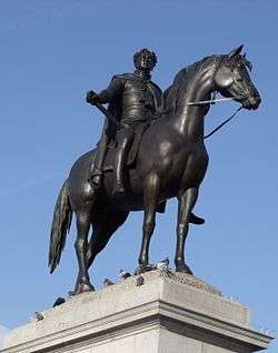 A close up of the statue on top of the plinth