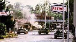 damaged YPA tanks on the road