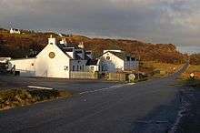 image of building with beautiful landscape behind it