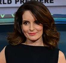 Fey smiling