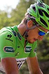 Peter Sagan wearing a green cycling jersey.