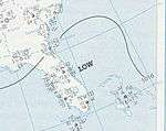 A surface weather analysis of the Florida Peninsula. A tropical depression sits just offshore, as indicated by the word "Low"