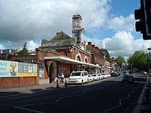 Photograph showing the exterior of Tunbridge Wells station, down side buildings.