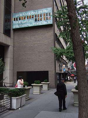 Photo of the National Debt Clock on September 15, 2009, at which time it reads approximately 11.8 trillion USD in national debt