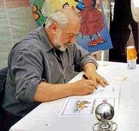 Urbain Servranckx signing an Urbanus comic (2004)