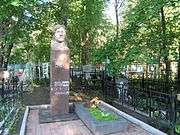 Grave marker topped with a bust