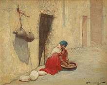 Woman preparing couscous by Vincent Manago