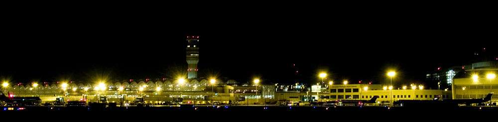 A view of the airport from the north, showing terminals B and C, taken from Gravelly Point, a popular park for watching planes take off or land