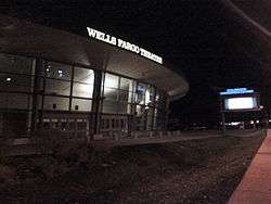 Exterior of Wells Fargo Theatre. Viewed at night from the Speer and Stout intersection