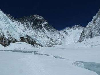 Photograph of a snowy, mountainous landscape