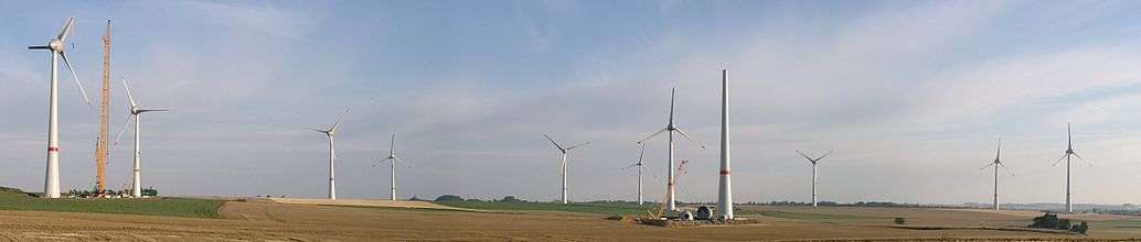 First wind farm consisting of 7.5 megawatt (MW) Enercon E-126 turbines, Estinnes, Belgium, 20 July 2010, two months before completion; note the 2-part blades.