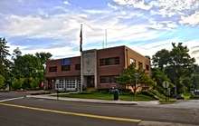 A two-story brick firehouse